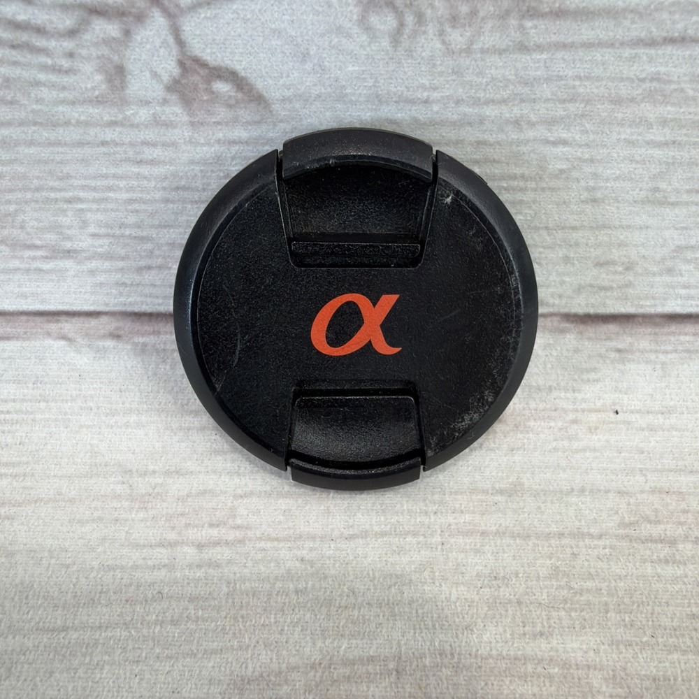 SONY ALPHA 55mm LENS FRONT COVER Black Genuine